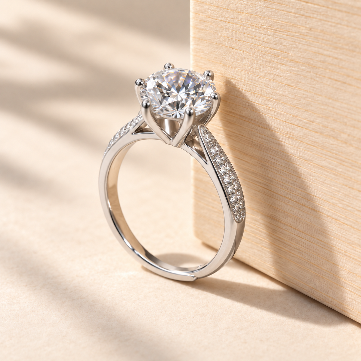 NEARHELD sterling silver moissanite ring beside pale wood in daylight