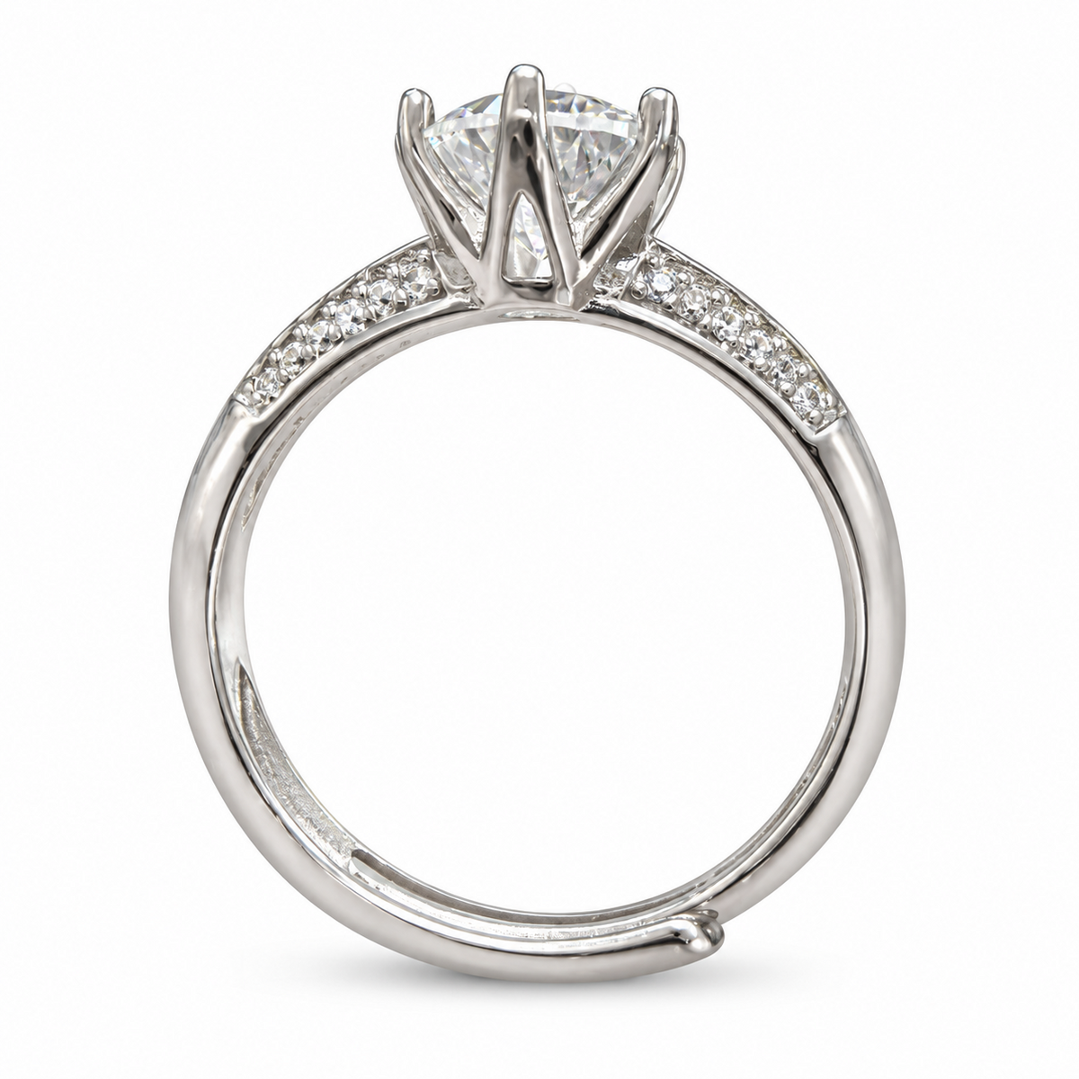 Side view of the NEARHELD round moissanite ring with an open six-prong crown and adjustable band