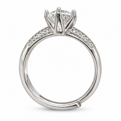 Side view of the NEARHELD round moissanite ring with an open six-prong crown and adjustable band