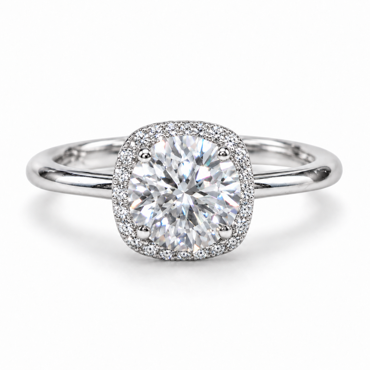 Front view of a round moissanite cushion halo ring with a plain silver band.