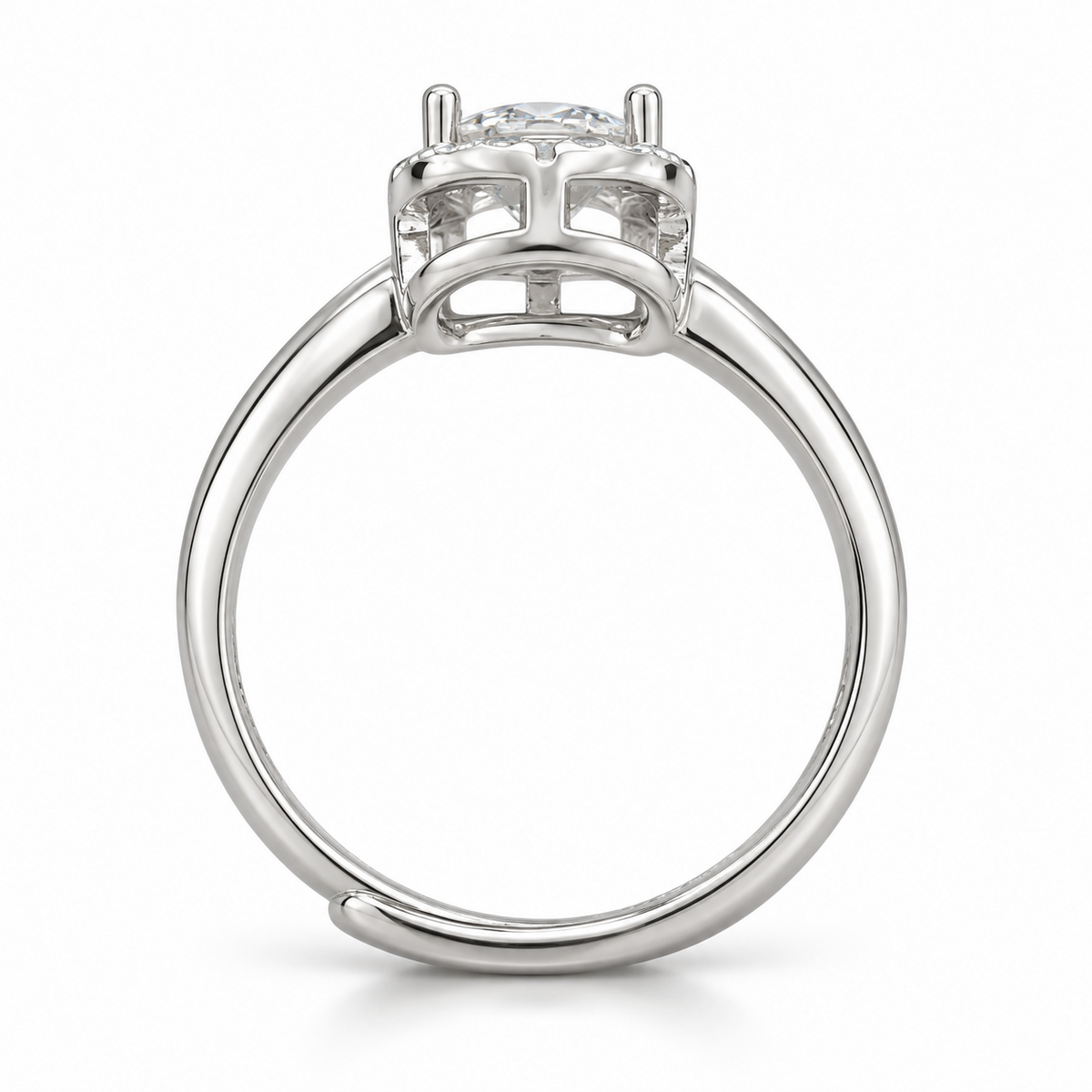 Side view showing the curved open basket and overlapping adjustable band of the silver halo ring.