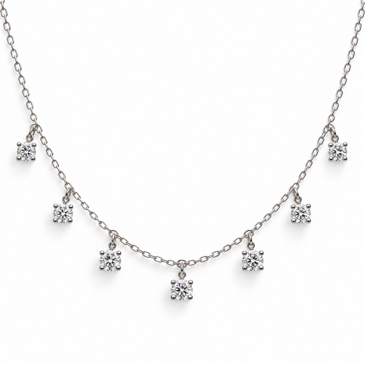 Seven-stone round moissanite necklace in 925 sterling silver on a white background